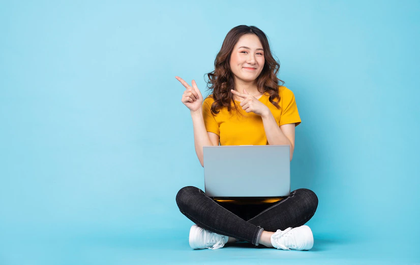 young-girl-sitting-using-laptop-with-expressions-gestures-turquoise_296537-245